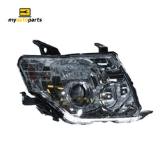 Halogen Head Lamp Drivers Side Genuine suits Mitsubishi Pajero 2008 to 2014