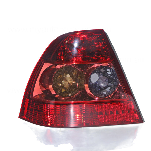 Tail Lamp Passenger Side OEM Suits Toyota Corolla ZZE122R Sedan 4/2004 to 3/2007