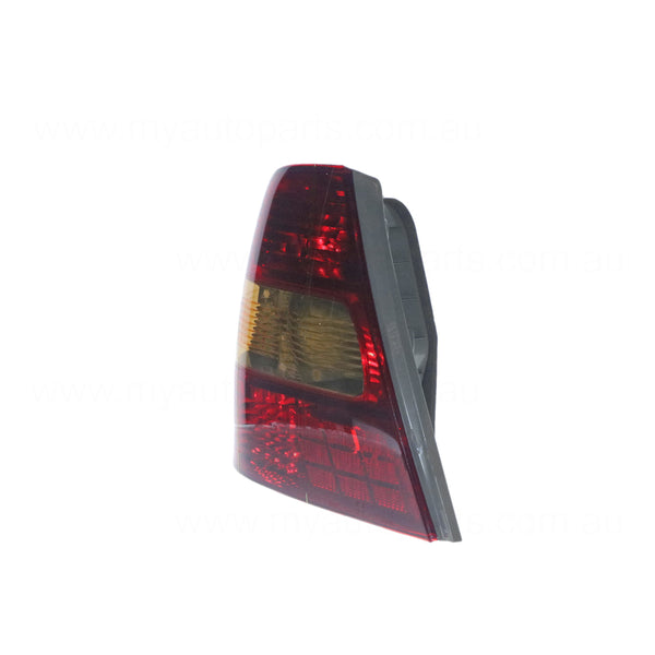 Tail Lamp Passenger Side OEM Suits Toyota Corolla ZZE122R Sedan 3/2003 to 8/2004