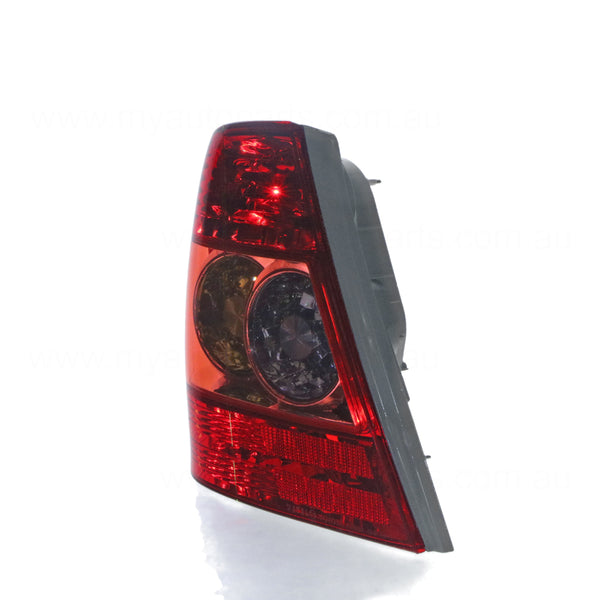 Tail Lamp Passenger Side OEM Suits Toyota Corolla ZZE122R Sedan 4/2004 to 3/2007