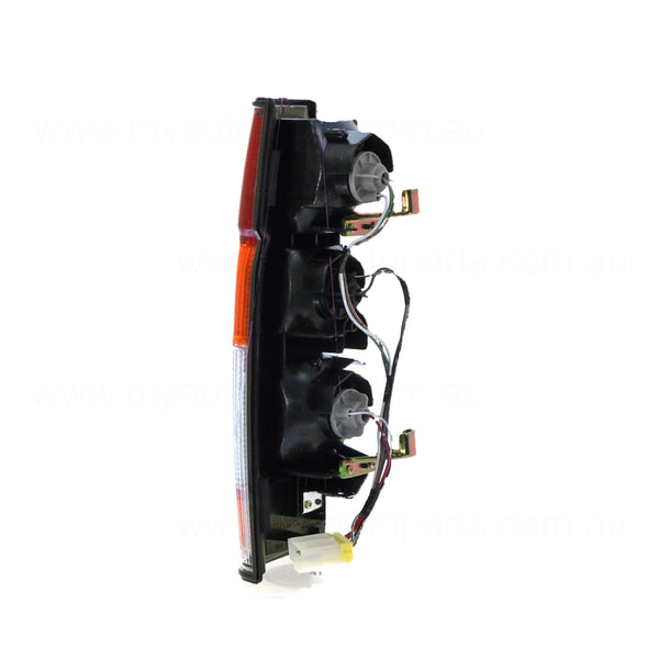 Red/Amber/Clear Tail Lamp Drivers Side Aftermarket Suits Nissan Navara D21 1992 to 1997