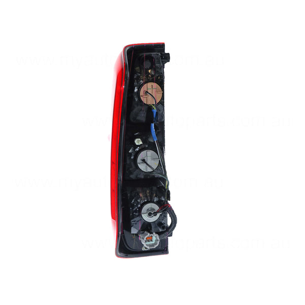 Red/Clear Tail Lamp Drivers Side OEM Suits Nissan Navara D40 2005 to 2015