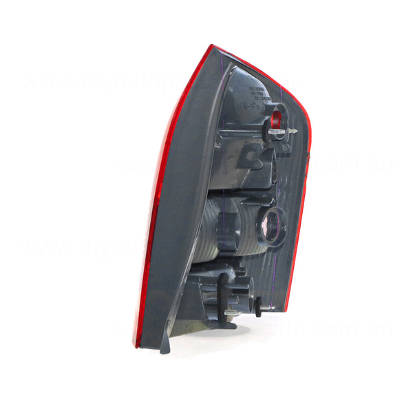 Tail Lamp Passenger Side OEM Suits Mazda 323 Protege BJ Sedan 6/2002 to 12/2003
