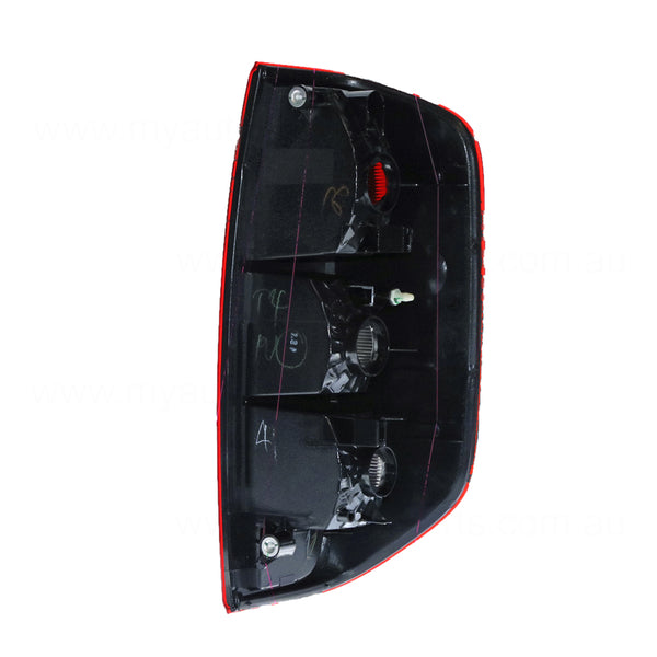 Red/Clear Tail Lamp Passenger Side OEM Suits Nissan Navara D40 2005 to 2015