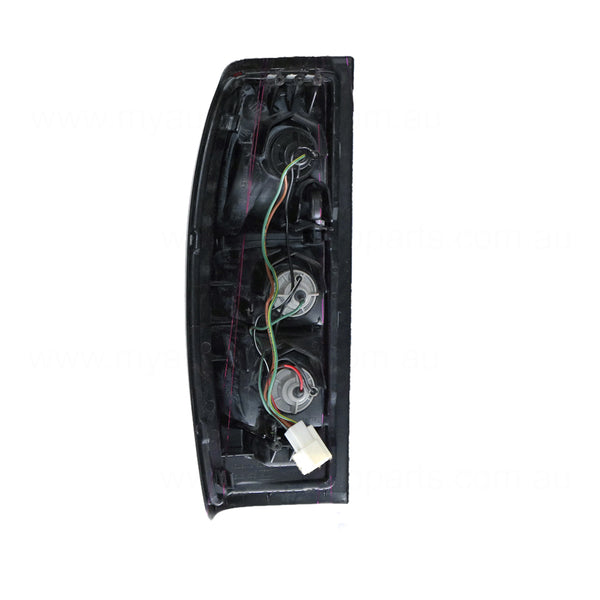Tail Lamp Drivers Side OEM Suits Nissan Navara D22 2001 to 2015