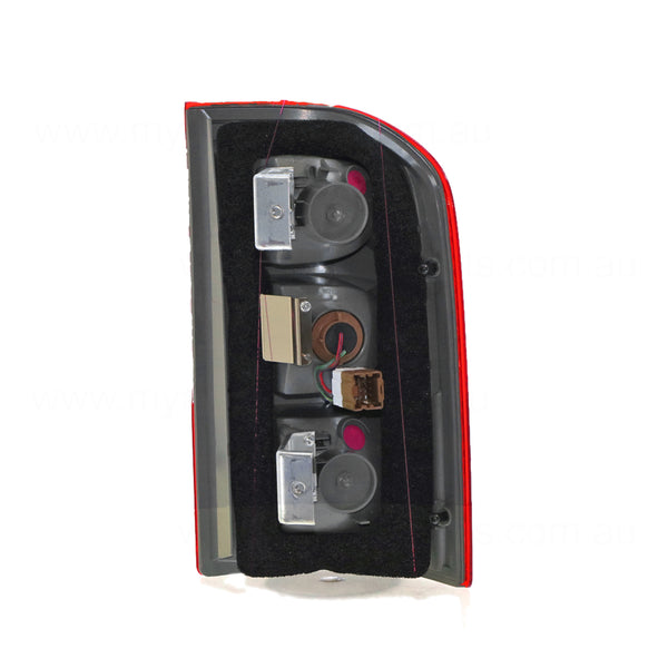 Tail Lamp Passenger Side OEM Suits Nissan Patrol GU/Y61 9/2001 to 8/2004