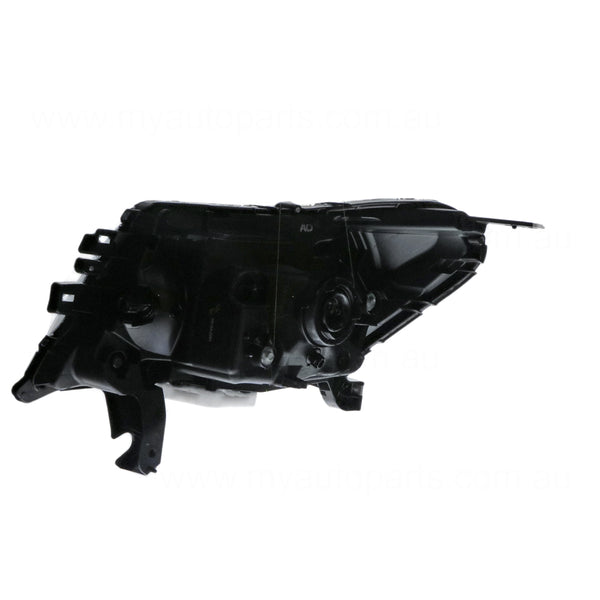 Halogen Head Lamp Drivers Side OEM suits Nissan Navara