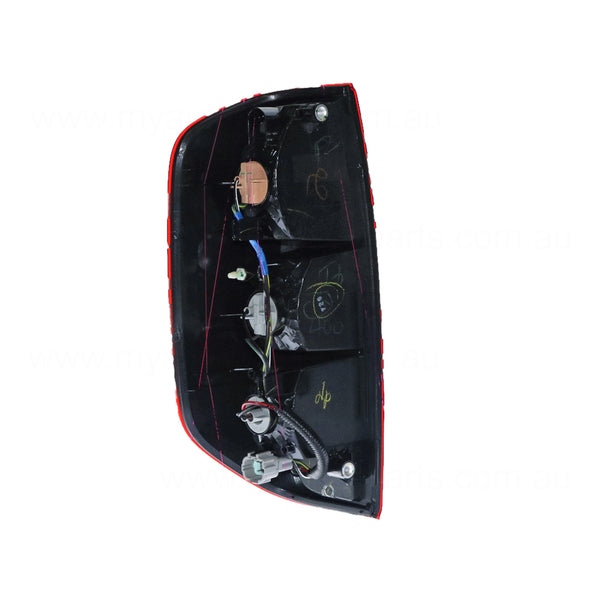 Red/Clear Tail Lamp Drivers Side OEM Suits Nissan Navara D40 2005 to 2015
