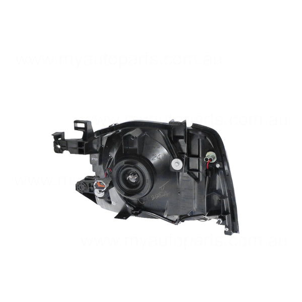 Halogen Head Lamp Drivers Side OEM Suits Nissan Navara D22 2001 to 2015