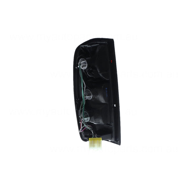Red/Amber/Clear Tail Lamp Drivers Side Certified Suits Nissan Navara D22 1997 to 2015