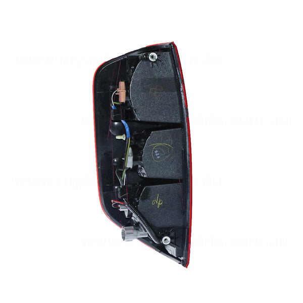 Red/Clear Tail Lamp Drivers Side OEM Suits Nissan Navara D40 2005 to 2015
