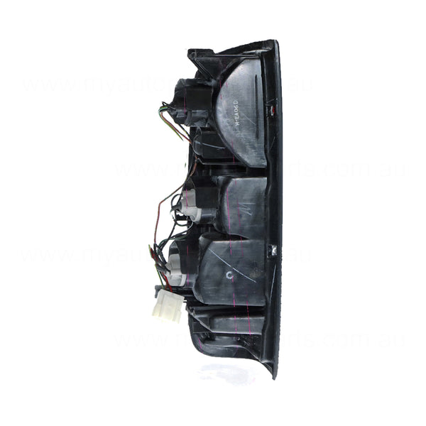 Tail Lamp Drivers Side OEM Suits Nissan Navara D22 2001 to 2015