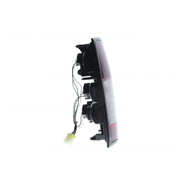 Red/Amber/Clear Tail Lamp Drivers Side Certified Suits Nissan Navara D22 1997 to 2015