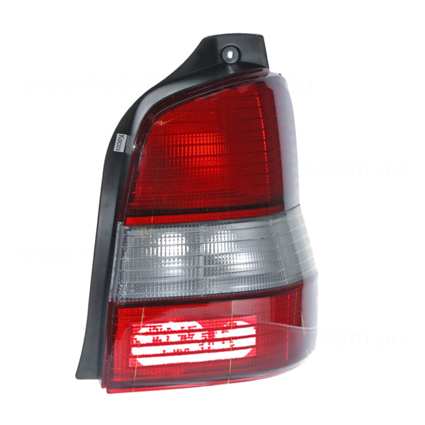 Tail Lamp Drivers Side OEM Suits Mazda 121 DW 11/1996 to 2/2000