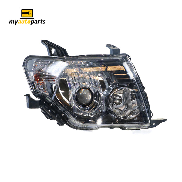 Halogen Black Head Lamp Drivers Side Genuine Suits Mitsubishi Pajero NT 2009 to 2011